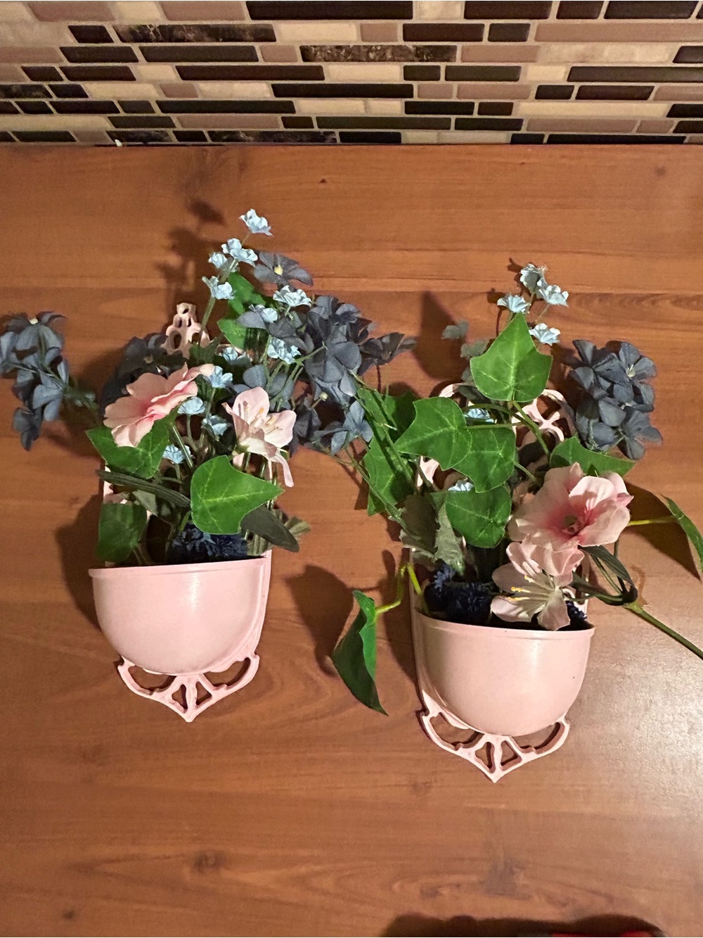 Pair of Pink Wall Planters with Faux Blue and Pink Flowers